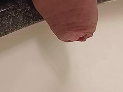 Extreme close up uncut foreskin and pissing