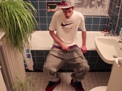 Young stud lets loose and wets himself in a naughty display