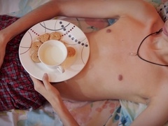 Latin twink Magic C satisfies his Christmas cravings by jerking off his massive cock and covering some festive cookies in his cum, then indulging in a