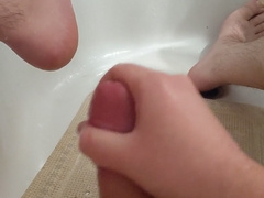 Thick Uncut Cock Unloads Massive Cumshot