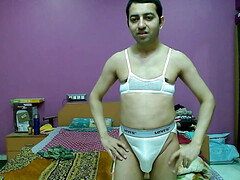 Hot crossdresser in openfront white bra and high waist thong removes clothes and masterbute with his big black cock.