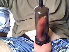 Dick With Condom And Cockring In Vacuum Pump