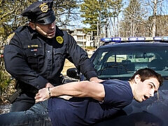 Johnny Rapid fucked by Damien Stone in an interrogation room