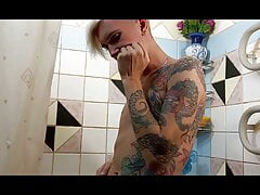 Sweet Niki bask in the shower.