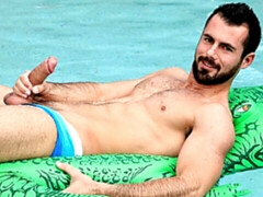 Beautiful Brock Cooper cums next to a swimming pool