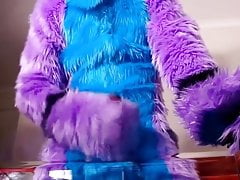 Guy in Murrsuit Paws Off onto a Table