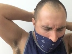 Muscular jock tied up and silenced with a tennis ball in mouth