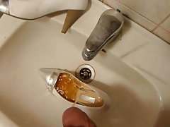 Piss in wifes silver and white high heel shoe