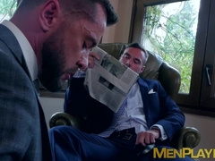 Hunky businessmen sucked and ridden by bearded colleague
