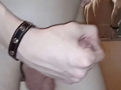 Horny young stud enjoys a steamy shower as he pleasures his delicious cock with a massager, culminating in an explosive climax!