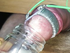 Collecting cum from my electro tortured cock