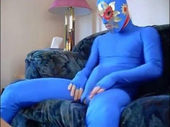 dude in mask a blue zentia suit strokes his big cock 7