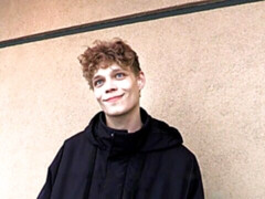 Curly-haired bottom getting banged on a gnarly bed