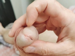 Father fondles his bizarre fuckpole close-up and blows a load on his belly