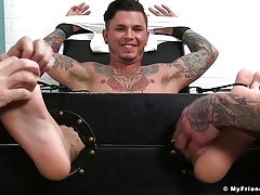 Inked Set Knight has his feet locked before being tickled