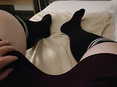 Femboy in skirt and high socks jerks off in a Hotel room