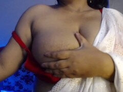 Fiery Indian babe delights in steamy sex by opening her bra and teasing nipples.