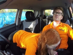 Redhead minx with glasses seduced her driving instructor