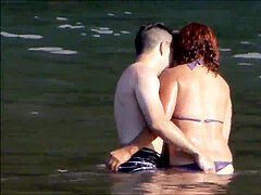 amateur couple frolicking at beach - Madeira Island - Seixal