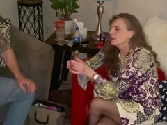 Agness, the lipstick-wearing cuckold, expertly gives a blowjob to her dominant Bull