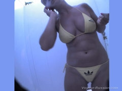 Beautiful babe takes a hot shower and tries on outfits