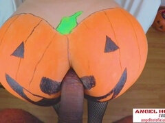 halloween pumpkin getting romped by dark-hued meatpipe