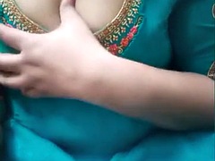 Big tits desi aunty in dress showing cleavage