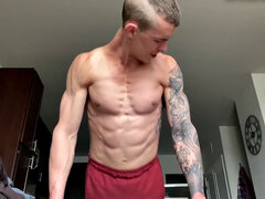 Ripped jock masturbates and plays with big dildo solo