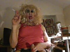 Sissy crossdresser cumdump inserts big black dildo in her lady hole, jerks off, smokes