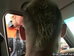 Granny swallows two cocks in the fields