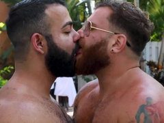 Strong men enjoy anal sex by the pool