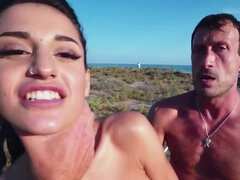 MILF with black hair does outdoor porn on a wooden path