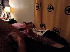 Me playing with my new toy from Amazon in fishnet stockings