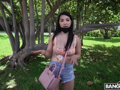Asian Mina Moon is getting picked up outdoors