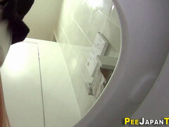 japanese urinates on public toilet