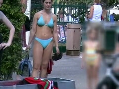 Her bathing suit gets semitransparent when it's moist