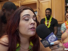 Scarlett Venom is standing and she is chatting to other people at the party while getting banged in the doggy style interracial pose by Ace Bigs.