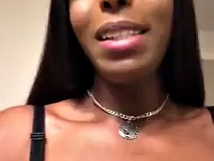 Beautiful ebony tranny with big boobs