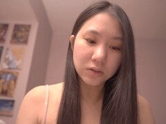 Asian girls engaging in intimate pillow talk