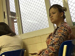 High high-heeled slippers in classroom candid