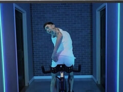 Muscular fellows with tattoos are riding bike and cocks