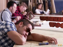 Muscled guy fucks cute brunette in the workshop