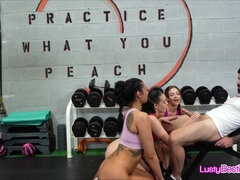 Gym besties in spandex sharing knob