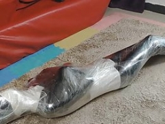 Leather menial plastic wrap mummy