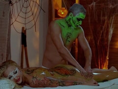 Big-breasted Hungarian blonde slathered in green oil for Halloween-themed romp - Kayla Green