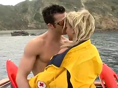 Busty blonde on a boat