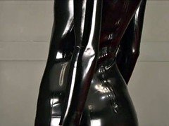 Black latex suit babes posing in rubber boots and tight pvc