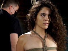 BDSM session showing a brunette that's about to suffer