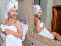 lusty busty brunette Lola Bredly plays with her wet shaved pussy