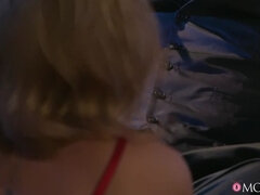 Mature blonde seduces in stockings
